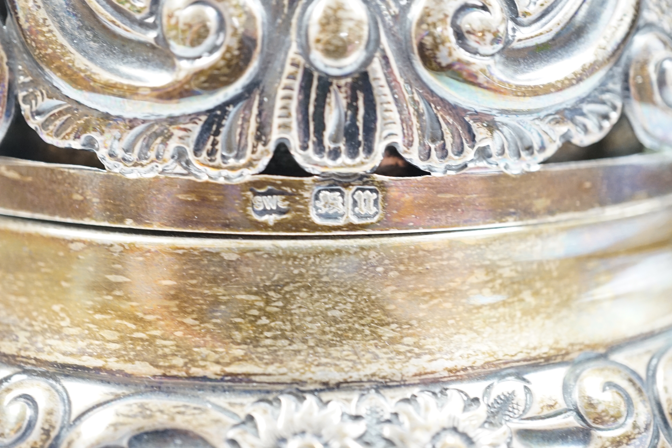 A late Victorian pierced silver mounted table bell, Samuel Walton Smith, Birmingham, 1894, base diameter 13.2cm.
